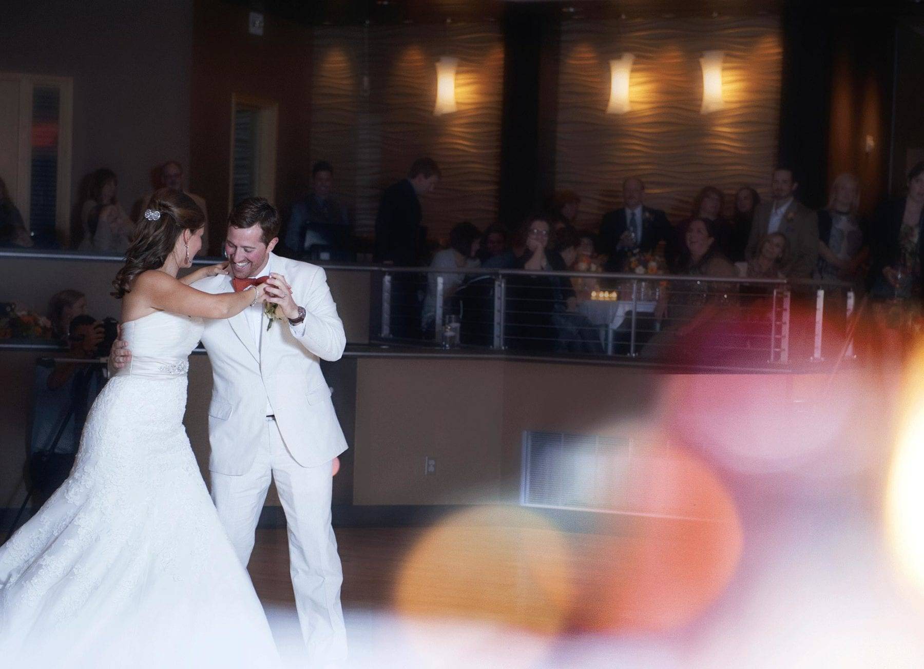 Bride and groom on a colorful dance floor